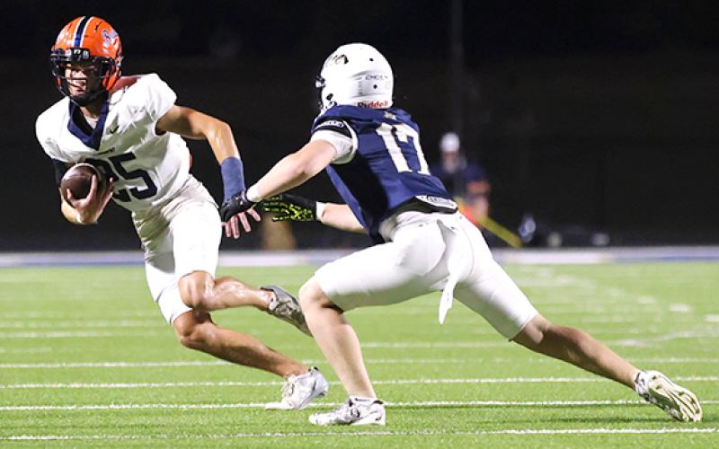 Habersham Central defensive back Sutton Porter (25) picks the ball off during the football game between Habersham Central and Apalachee Friday night. (Landen Todd/Staff)