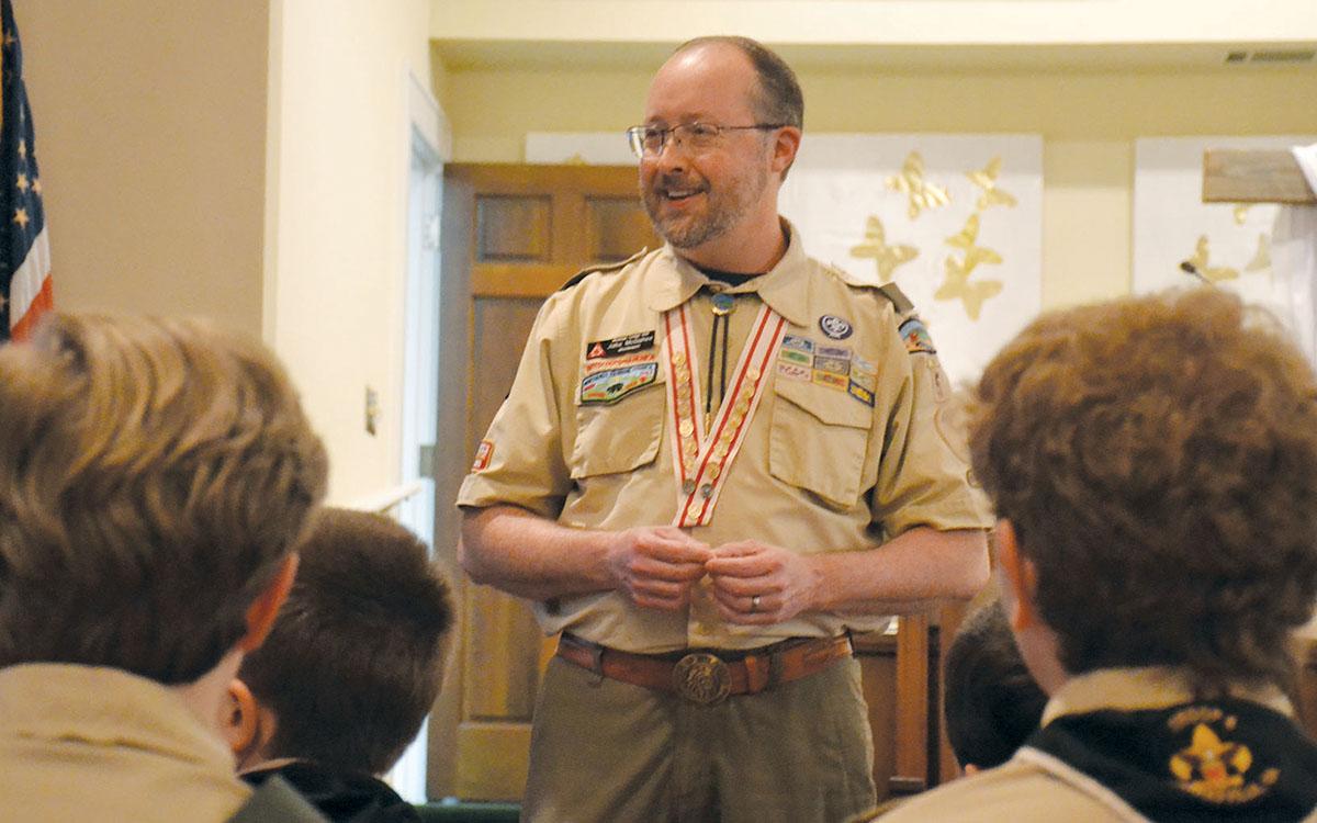 Jake McGahee speaks to Troop 5 during his final Scoutmaster Minute at the May Court of Honor on May 5. (Samantha Sinclair/Staff)