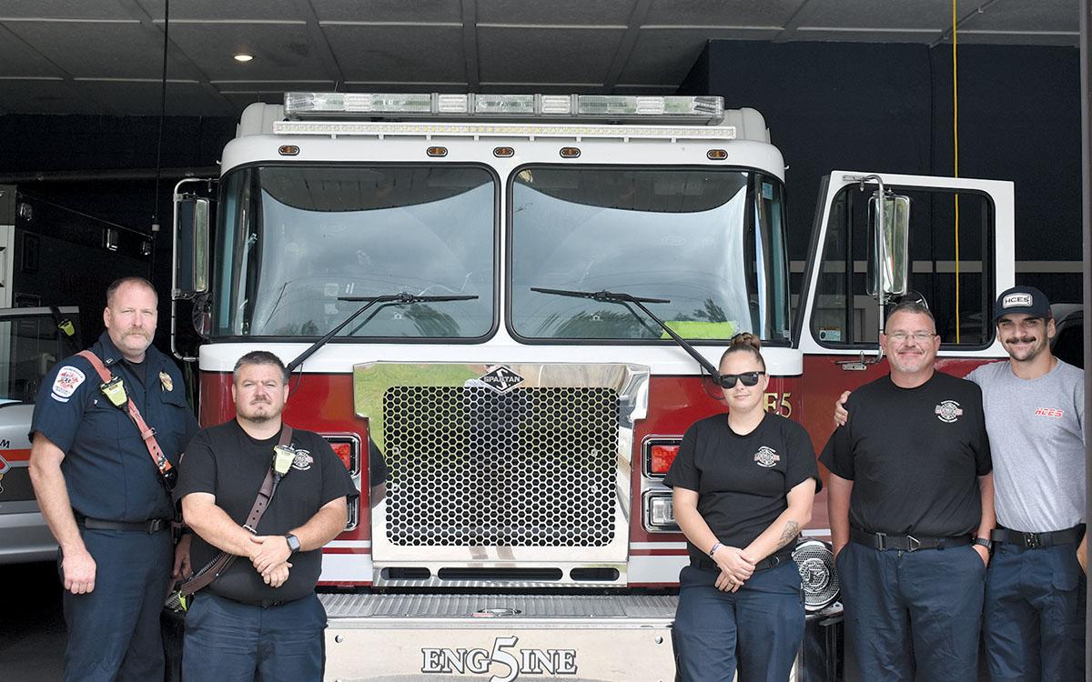 Station 5’s Brandon Whitney, Keith Borton, Kayden Harper, Tyler Downs and Kyle Cash continue working as station renovations near completion. (Noah Ansley/Staff)