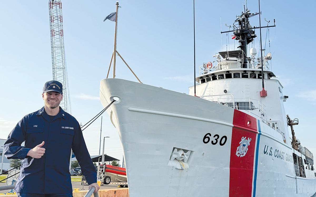 Blaine Lyle poses in front of the Coast Guard Cutter Alert ship in Cape Canaveral, Fla. (Submitted)