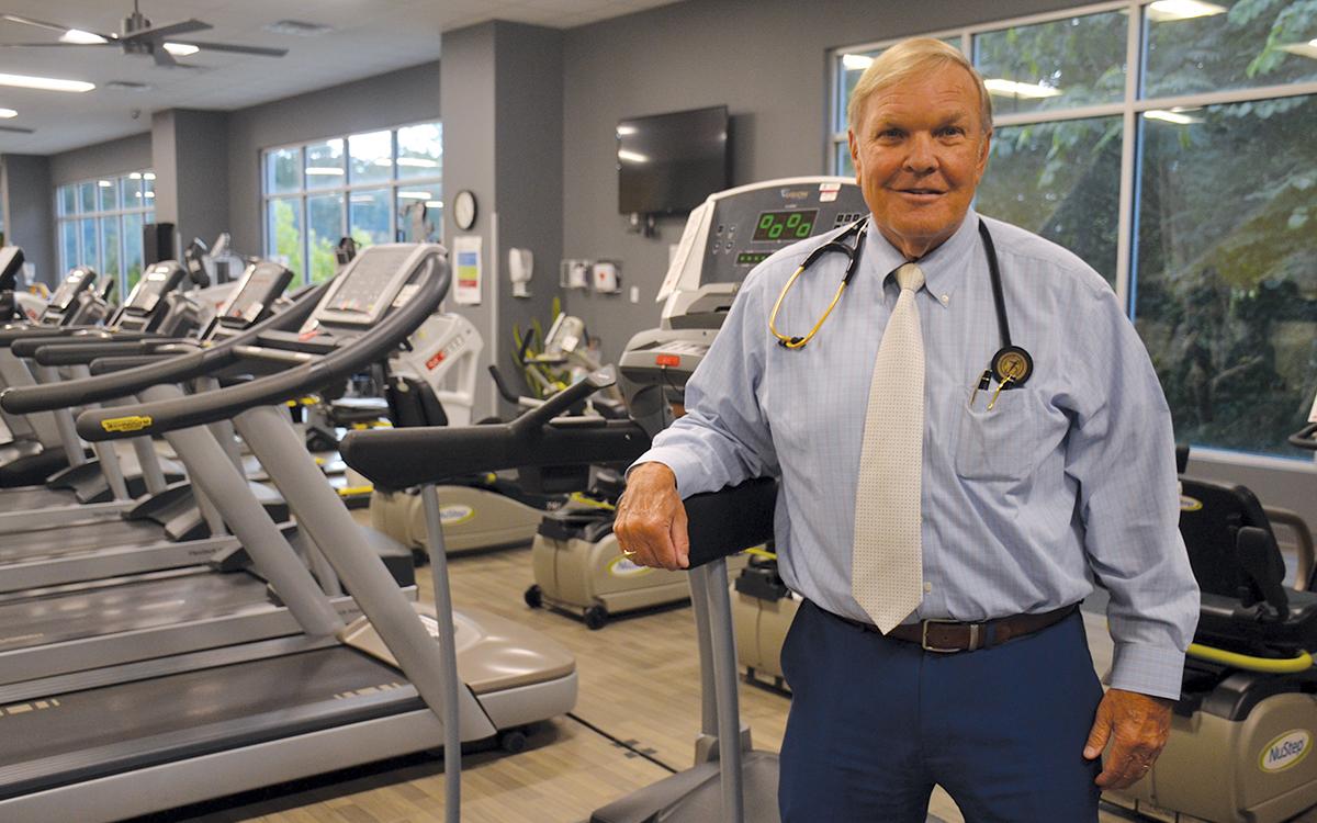 Dr. Stuart Sanders stands the plethora of equipment now available in the Rehabilitation and Orthopedics Complex at NGMC Habersham. When he started the rehabilitation program, it had only three pieces of equipment. (Samantha Sinclair/Staff)
