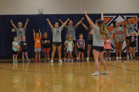 Campers perform a cheer at the beginning of the Future Lady Raiders Cheerleading Camp Tuesday.