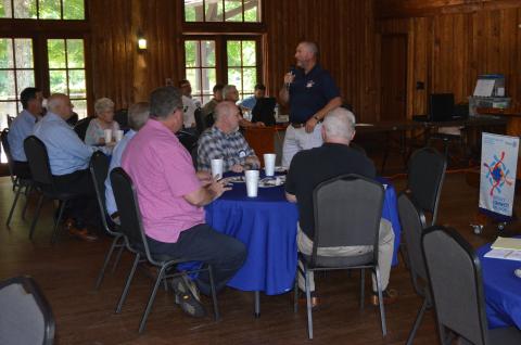 Habersham Central High School Football Coach Benji Harrison speaks to members of the Rotary Club of Habersham County Thursday at the Cornelia Community House.