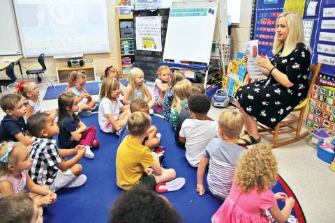 Habersham County Schools, along with the thousands of students who attend them, returned to “class as usual” Wednesday, Aug. 7. Shown is Clarkesville Elementary School kindergarten teacher Kristi Thurmond explaining classroom conduct to her students the morning of the first day of school. Prior to the first day, students and their parents/guardians turned out for open houses earlier this week. For additional back-to-school photos, see Page 6A, this edition.