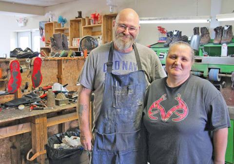 Becky and Billy Bending have owned Country Cobbler Shoe Repair in Cornelia for nearly five years. Billy Bending has been a cobbler for over 30 years and Becky Bending has been in the profession for over 20 years. (Photo/ERIC PEREIRA)