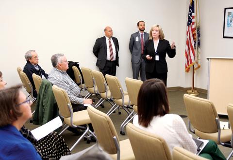 Habersham Medical Center CEO Lynn Boggs addresses the audience during the Monday evening public forum in which about 40 people attended. Behind her are from left, HMC Chief Financial Officer Steve Ciampa and HMC Vice President of Strategy, Business Development and Governmental Relations Tyler Williams. 