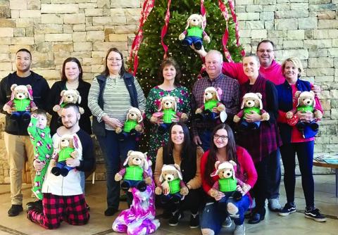 Habersham County Farm Bureau handed out Belkie Bears to patients at Habersham Medical Center as part of their Beary Merry Christmas on Wednesday morning. Participants are, back row from left, Malik Perry, Katie Peck, Julie Owens, Janet Wilbanks, Jimmy Kowalsky, Habersham County Farm Bureau president; Cheryl Kowalsky, Habersham County Women’s Committee; Tim Bryant, agency manager; and Chris Bryant. Front row are, from left, Joseph Peck with Noah, Raven Peck, Brette Bryant and Lauryn Bryant.