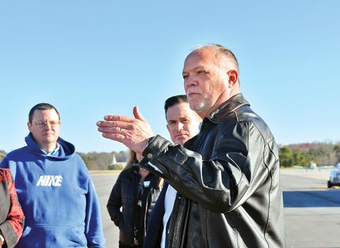 Joe Pardue, Air Methods area manager, talks to the assembled guests during the AirLife ribbon cutting on Wednesday morning.