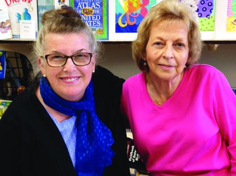 Director of the Children’s Art Gallery Jan Walker, left, poses with the late Glenda Boling. Boling supported several local authors and artists while operating Books with A’peal.