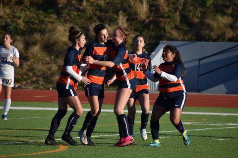 Habersham Central’s Anna LaBarbera, from left, Addie Penick, Sydney Turner, Abigail Deleon and Maria Miguel celebrate a goal from Penick during the second half of the Lady Raiders 5-2 victory over Dawson County High School Friday.