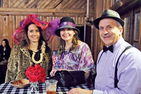 Kecia Jones of Demorest and Greg and Laura Lee Burrell of Cornelia pose for a photo at Saturday’s “Night at the Derby.”
