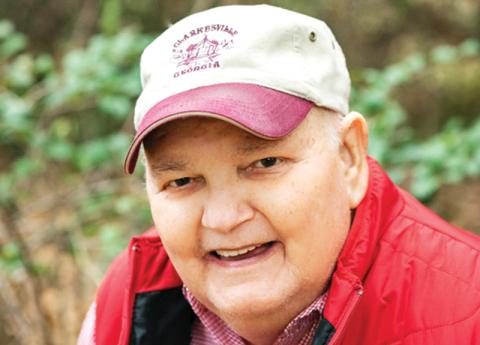 At a family photo shoot in November, Sam Tolbert wanted to have his photo made in his Clarkesville cap. “I think his smile says it all,” said longtime friend Lane Gresham.