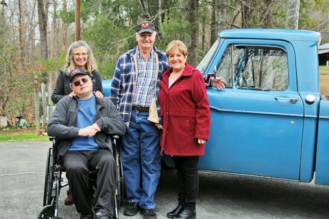 Gathering Sunday are (from left) June Waters, Jimmy Waters, Donald Allen and Judy Allen, Jimmy’s second cousin. Donald refurbished the 1966 Ford pickup for his friend.