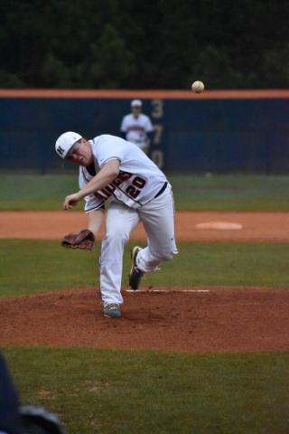 Habersham Central's Hunter Tatum (20) throws a pitch during the first inning of the Raiders' 11-1 loss to Chestatee High School Wednesday.