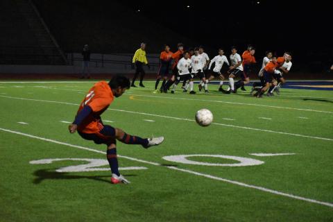 Habersham Central's Yobani Alvarez sends a free kick into the box during the Raiders' 2-1 loss to Lanier High School Friday.