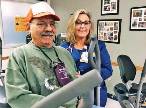 Lisa Reiss, Program coordinator for HMC’s cardiac and pulmonary rehab program, works with patient Jesse Garcia.