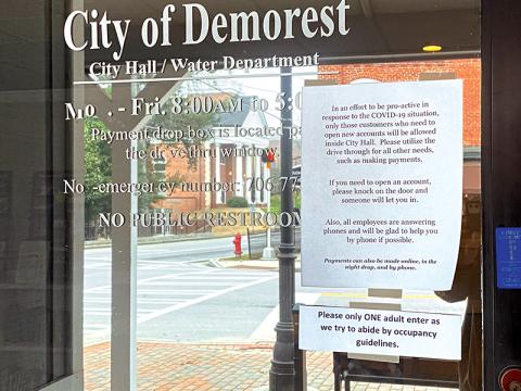 Instructions at Demorest’s City Hall echo others around the county trying to keep residents and city employees safe.