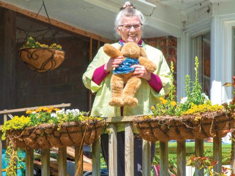 Artist and author Jan Walker holds the stuffed rabbit she has displayed at her house on Chambers Avenue in the Tower Mountain neighborhood of Cornelia. Walker also has two stuffed cats displayed as part of the neighborhood’s “bear hunt,” which is an effort to give children something to do while “sheltering in place” during the coronavirus pandemic.
