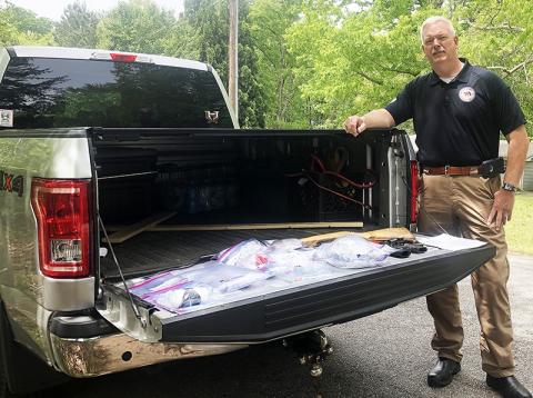 Habersham County Sheriff Joey Terrell shows off some of the seized drugs from a raid in Alto on Wednesday.
