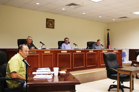 Baldwin Mayor Joe Elam speaks during the Monday city council meeting. Behind him are Councilmen Theron Ayers, Jeff Parrish and Larry Lewallen. 