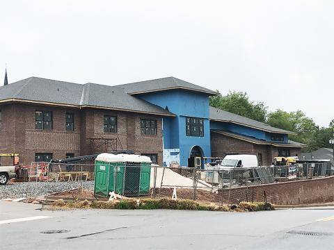 The new Cornelia administration building is scheduled to be open by the end of May, but bad weather has slowed the outdoor portions of the construction, City Manager Donald Anderson said Thursday.