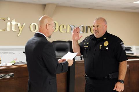 Demorest Police Chief Robin Krockum was sworn in by Mayor Rick Austin again at the Tuesday Demorest meeting following three weeks of confusion when he was terminated by City Manager Kim Simonds April 16. 