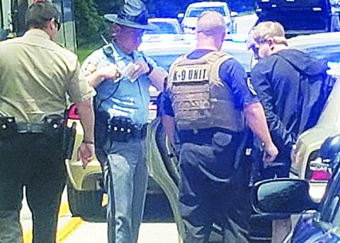 Habersham County Sheriff’s deputies arrest Blake Belback after a high-speed chase ended on Duncan Bridge Road. Photo by ALAN NESMITH