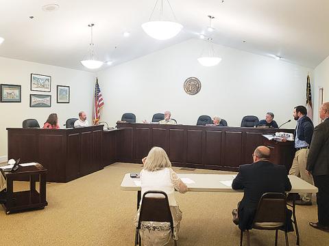 Clarkesville City Council discusses a presentation by Cornelia Mayor John Borrow on Monday night.
