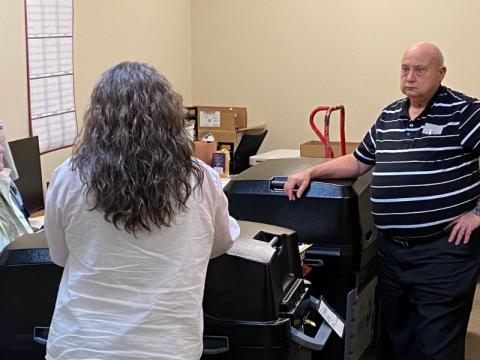 Board of Elections Chairman Carroll Jeffers and Elections Supervisor Laurel Ellison count the ballots stuck in the voting machines of the June 9, 2020 recount.
