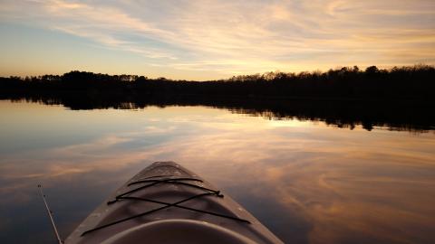 Michael Hall / Seen from a kayak, Lake Hartwell is beautiful in the sunset.