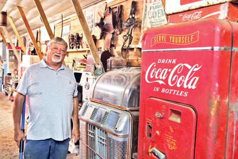 Bobby Irvin gives a tour of the chicken coop he converted in a bluegrass venue which has hosted several local and recognizable names in bluegrass music.