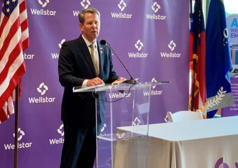 Gov. Brian Kemp speaks at a news conference Thursday.