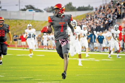Habersham Central’s Josh Pickett takes it in for a touchdown during a game last season. Pickett was tapped for Sports Illustrated’s All-American watch list for 2020.
