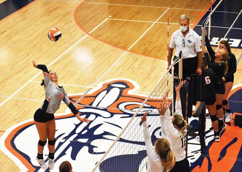 Habersham Central’s Madeline Koshuta (8) looks to spike the ball during the Lady Raiders’ match against Tallulah Falls Aug. 18.