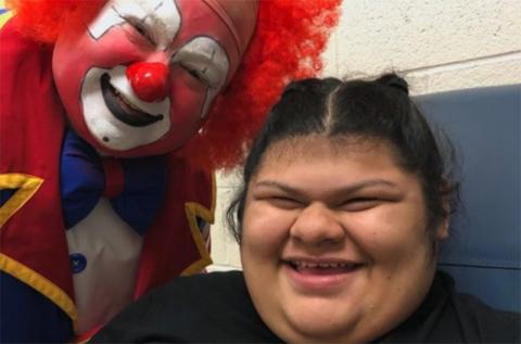 Lucero Ramirez was all smiles when a clown came to visit her school.
