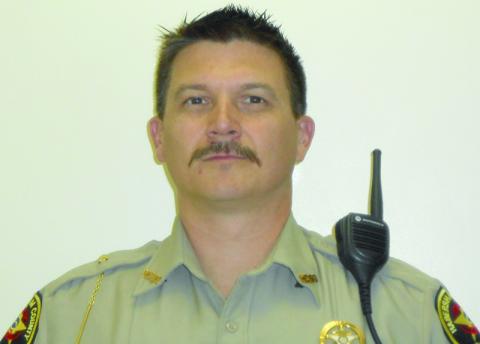 Shawn Gragg currently owns an upholstery business and formerly was in law enforcement collectively for 22 years (shown in uniform in 2017). 