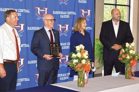Dr. Stacy Nicholson (second from left) accepts Habersham Central High School’s first lifetime achievement award from Principal Jonathan Stribling, Gifted Coordinator Martha Cantrell and Superintendent Matthew Cooper at a ceremony Friday night.