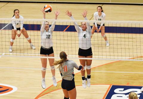 Tallulah Falls’ Barrett Whitener (12) and Abby Carlan (4) protect the net during their match with Habersham Central on Tuesday night.