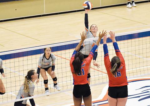Habersham Central’s Madeline Koshuta looks to power the ball past two Jefferson blockers on Thursday night.