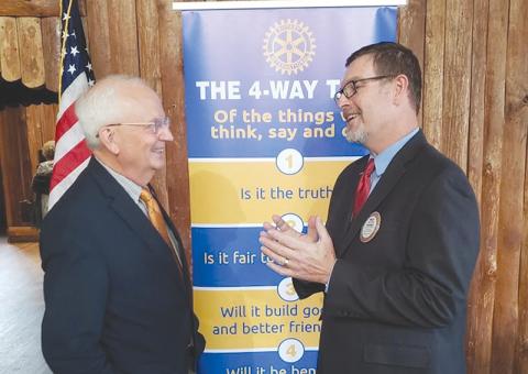 Georgia Agriculture Commissioner Gary Black (left) speaks with Philip Smith, President of the Rotary Club of Habersham County. ALAN NESMITH/Staff