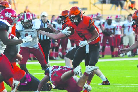 Habersham Central’s Jackson Clouatre jukes a defender on his way to a big gain on Friday night. Photo by LILLIAN VAN TASSEL