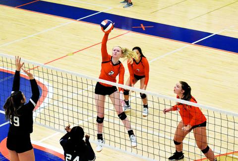 Habersham Central’s Molly Butler goes for a spike against Lumpkin County.
