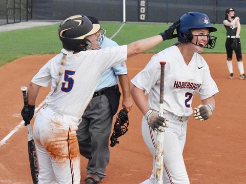 Brayden Staton and Preslee Hix celebrate after Hix’s sixth-inning go ahead home run. Photo by CODY ROGERS/Staff