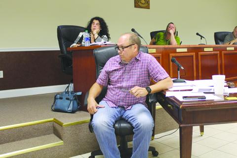 Baldwin Mayor Joe Elam listens to comments at Monday’s meeting of the city council.