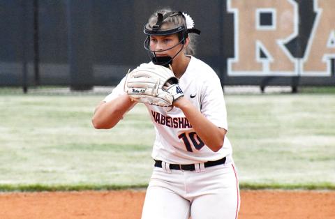 Kyla Quiles prepares to pitch against a powerhouse Buford Wolves batting order.