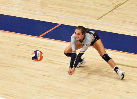 Habersham Central’s Camryn Fricks gets low for a dig during a recent home match.