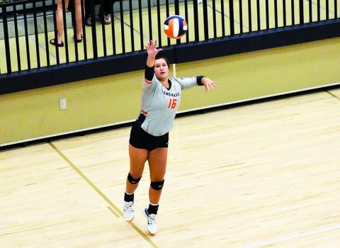 Habersham Central's Maddie Chosewood serves during Tuesday's match. ISAIAH SMITH/Staff