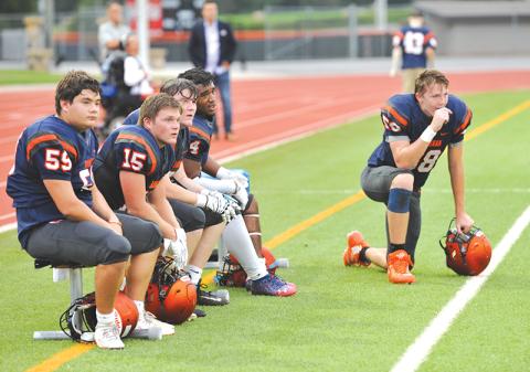 Habersham Central players (from left) Zane Hester, Patrick Tedder, Butch Cassidy, Simarcus Burney and Jonathan Adams watch intently from the sidelines during the intrasquad scrimmage last week. The first real game is Friday night when the Raiders host Madison County to open the season. TOM ASKEW/Special