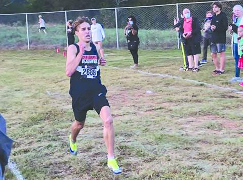 Habersham Central’s Andrew Kivett overcame an injury to win the regional cross country meet.