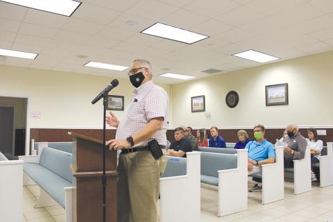 Baldwin resident Ronnie Franklin speaks at Tuesday’s city council meeting, expressing dismay with the proposed development slated for the Wilbanks and Thompson intersection.